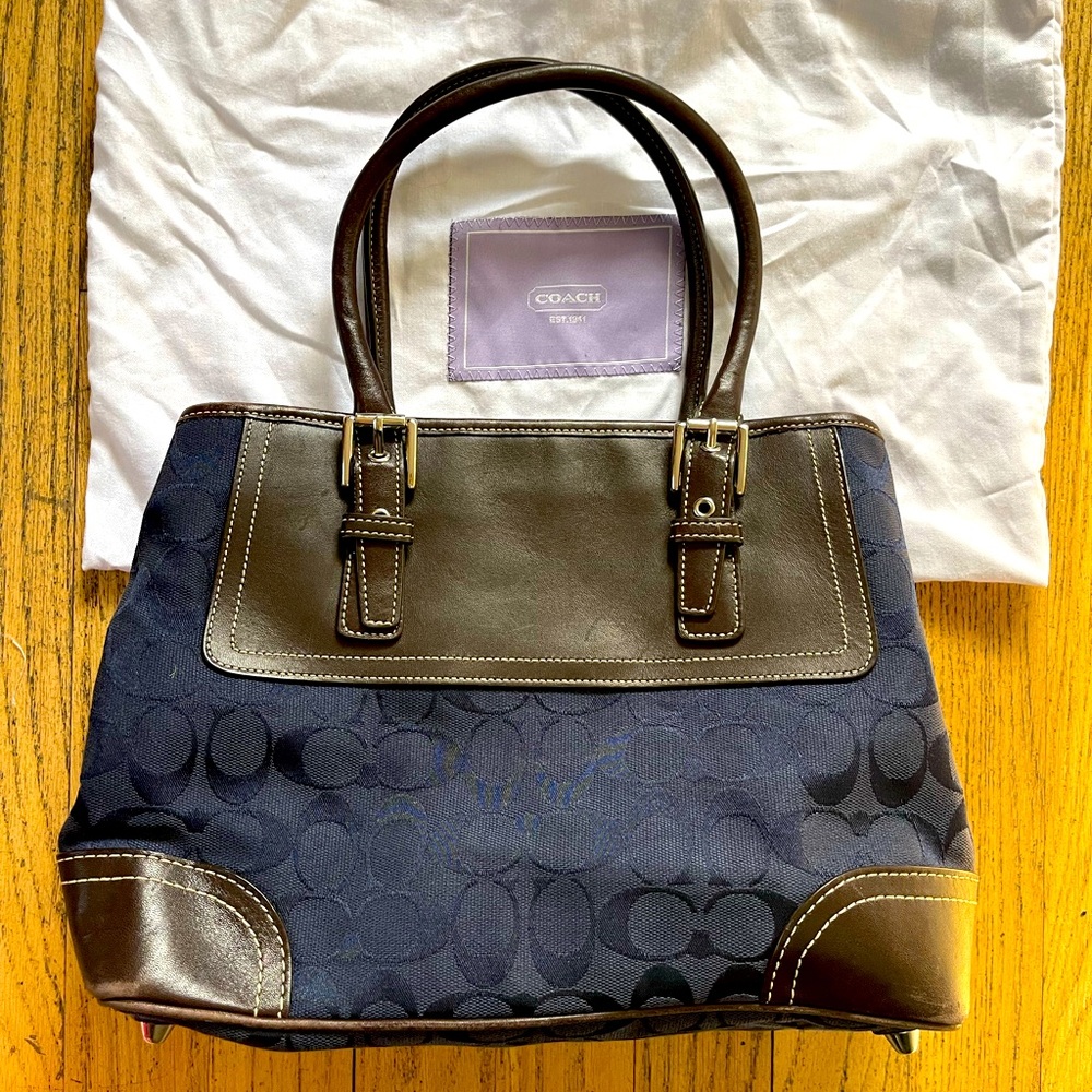 Signature blue Coach fabric pocketbook with brown leather details